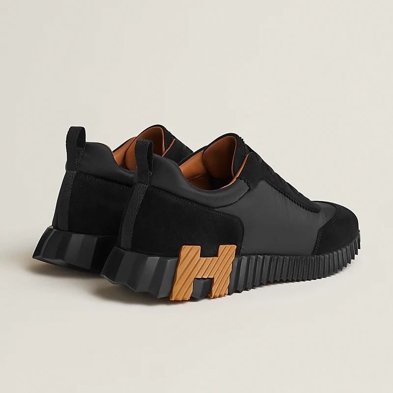 Bouncing Sneaker in Black Calfskin and Suede with Orange “H”