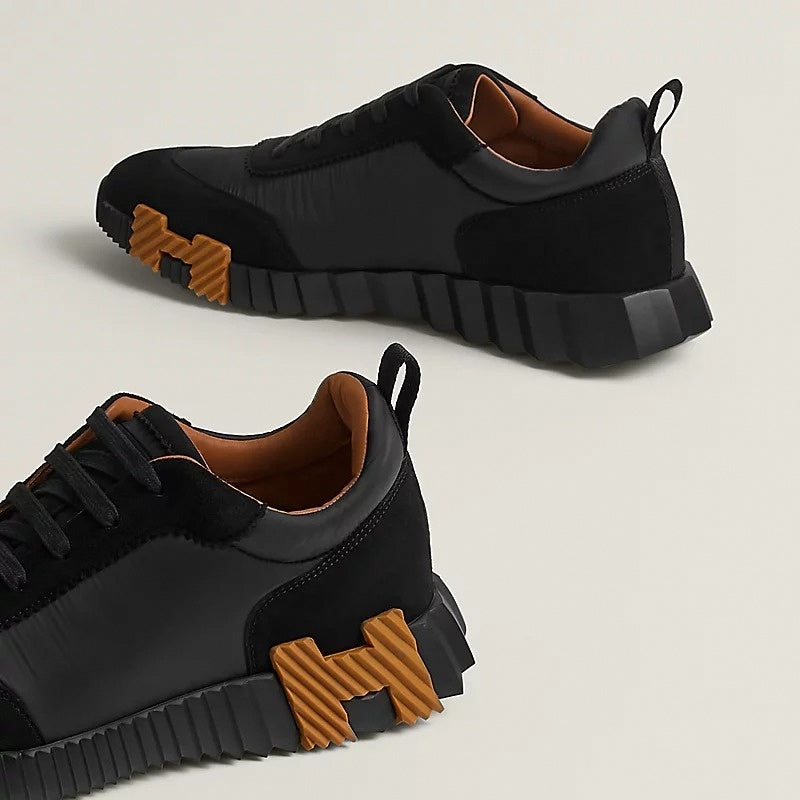 Bouncing Sneaker in Black Calfskin and Suede with Orange “H”