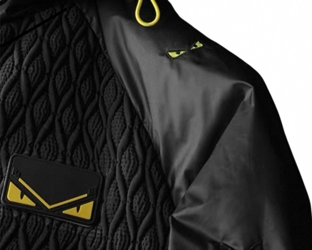 Hooded Puffer Jacket – Geometric Quilt & Monster Patch